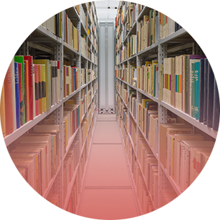 Long corridor in the Academy of Arts lined with bookshelves on both sides