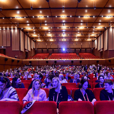 Plenary room full of people from ERC 2024.